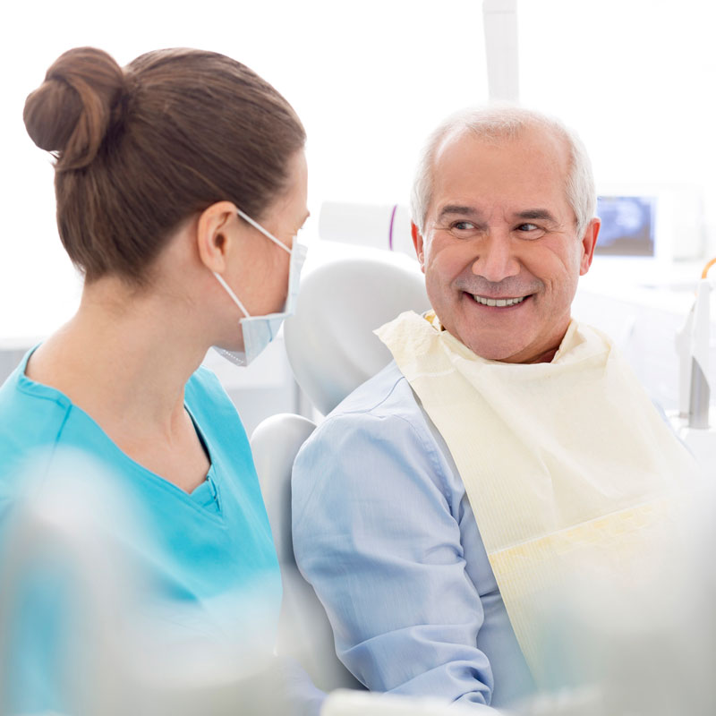patient and dentist smiling