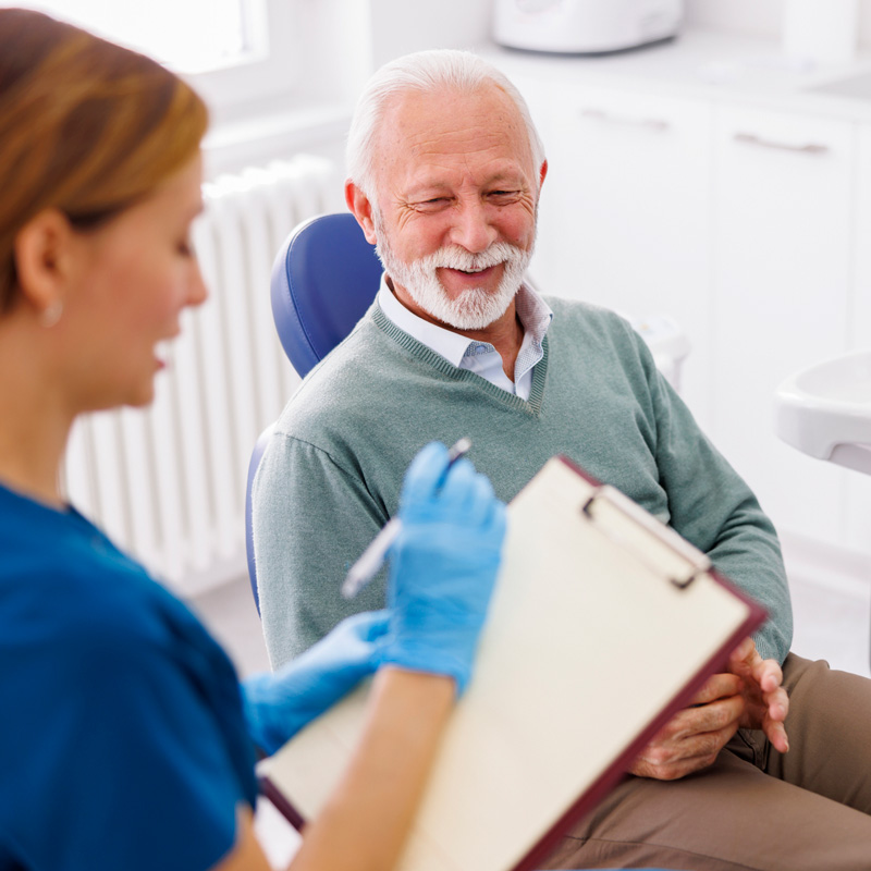 doctor and patient in dental chair