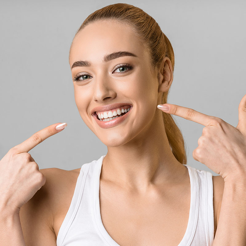 Happy woman showing her teeth