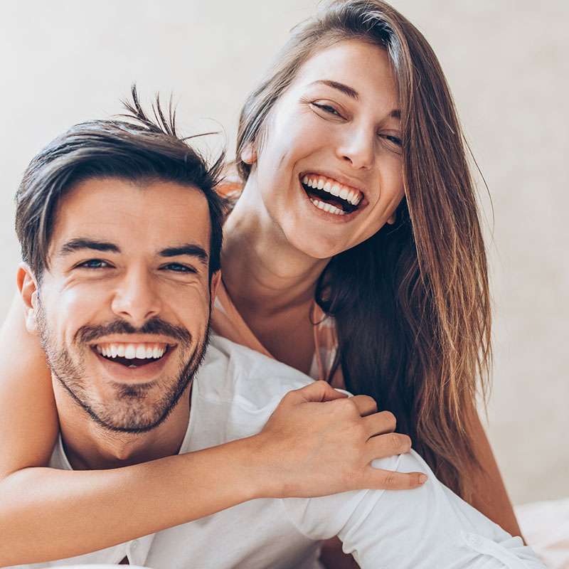 Happy young couple smiling